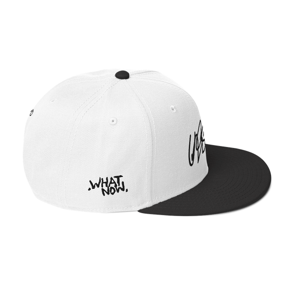 Snapback Hat- UNRSLVD TAG LOGO - 'what now' on side - embroidered