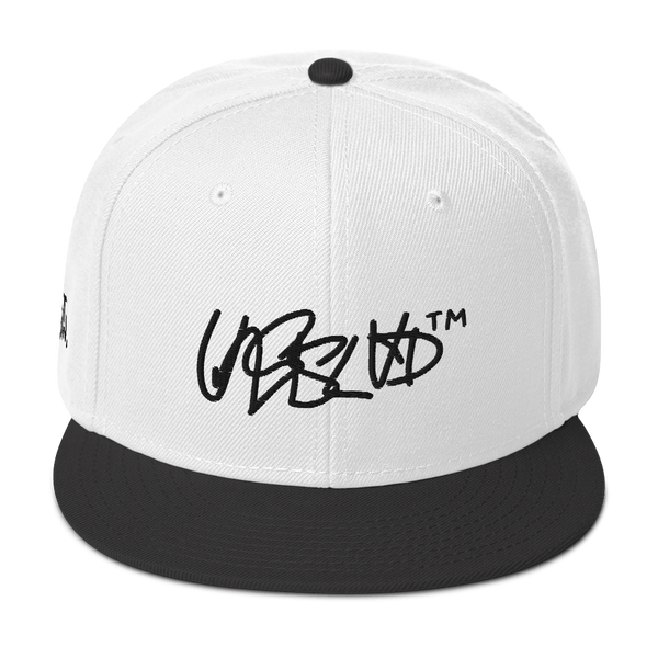 Snapback Hat- UNRSLVD TAG LOGO - 'what now' on side - embroidered